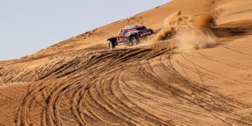 Carlos Sainz’s lead halved as Stephane Peterhansel and Nasser Al Attiyah thrill in penultimate stage