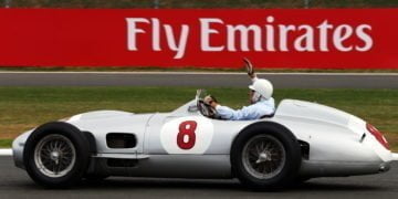 Motorsport world pays tribute to racing legend Moss