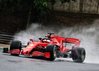 Vettel puts Ferrari on top in rain-hit Hungarian GP FP2