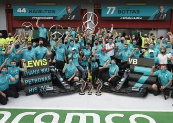 In photos: Mercedes marks magnificent seventh with century of hybrid era wins