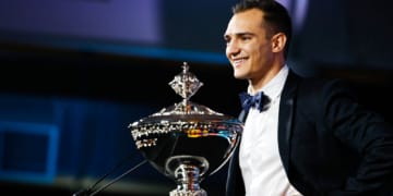 Palou on stage with the Astor Cup. Photo: IndyCar - Joe Skibinski