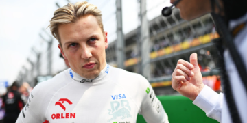 Liam Lawson has publicly apologised to Sergio Perez for a mid-race rude gesture