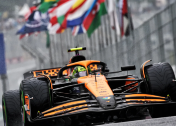 Lando Norris grabbed pole position in a wet qualifying in Brazil