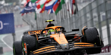 Lando Norris grabbed pole position in a wet qualifying in Brazil