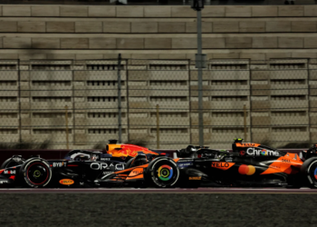 Lando Norris was unable to challenge Max Verstappen until the end in Qatar due to a penalty