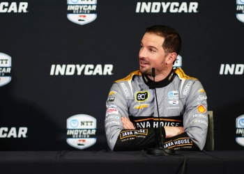 Rossi conducted interviews in his new-look grey fire suit. Photo: Kevin Dejewski