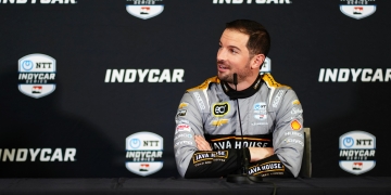 Rossi conducted interviews in his new-look grey fire suit. Photo: Kevin Dejewski