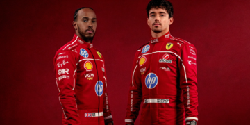 Lewis Hamilton and Charles Leclerc pose in new Ferrari 2025 F1 race suits