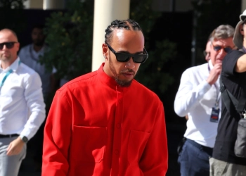 Lewis Hamilton arrived at the Yas Marina Circuit in red, a move which former team-mate Nico Rosberg believes was "inappropriate"