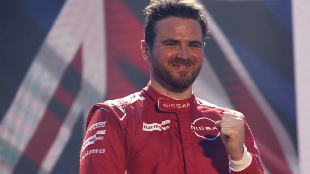 Race winner Oliver Rowland of Great Britain driving the (23) Nissan Formula E Team Nissan e-4ORCE 05 on the podium during the Jeddah E-Prix, Round 4 of the 2025 FIA Formula E World Championship at Jeddah Corniche Circuit on February 15, 2025 in Jeddah, Saudi Arabia