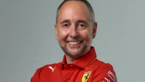Ferrari has won a legal battle with Enrico Cardile over his starting date with Aston Martin