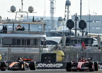 Ryo Hirakawa (JPN) McLaren MCL38 Reserve Driver and Charles Leclerc (MON) Ferrari SF-24. 06.12.2024. Formula 1 World Championship, Rd 24, Abu Dhabi Grand Prix, Yas Marina Circuit, Abu Dhabi, Practice Day