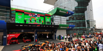 The podium (L to R): Lando Norris (GBR) McLaren, second; Oscar Piastri (AUS) McLaren, race winner; George Russell (GBR) Mercedes AMG F1, third; Charlie Hooper (GBR) Mclaren Director of Car Operations and Engineering. 23.03.2025. Formula 1 World Championship, Rd 2, Chinese Grand Prix, Shanghai, China, Race Day