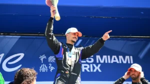 Race winner Pascal Wehrlein of Germany and TAG Heuer Porsche Formula E Team on the podium during the Miami E-Prix, Round 5 of the 2025 FIA Formula E World Championship at Homestead-Miami Speedway on April 12, 2025 in Homestead, Florida