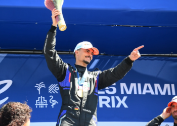 Race winner Pascal Wehrlein of Germany and TAG Heuer Porsche Formula E Team on the podium during the Miami E-Prix, Round 5 of the 2025 FIA Formula E World Championship at Homestead-Miami Speedway on April 12, 2025 in Homestead, Florida