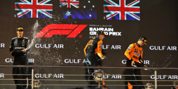 The podium (L to R): George Russell (GBR) Mercedes AMG F1, second; Oscar Piastri (AUS) McLaren, race winner; Lando Norris (GBR) McLaren, third. 13.04.2025. Formula 1 World Championship, Rd 4, Bahrain Grand Prix, Sakhir, Bahrain, Race Day