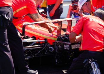 The Team Penske crew hard at work reattaching the rear wing on pit lane. Photo: Kevin Dejewski