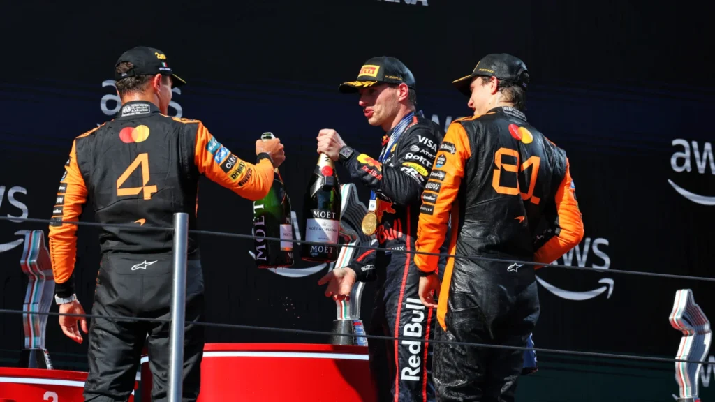 The podium (L to R): Lando Norris (GBR) McLaren, second; Max Verstappen (NLD) Red Bull Racing, race winner; Oscar Piastri (AUS) McLaren, third. 18.05.2025. Formula 1 World Championship, Rd 7, Emilia Romagna Grand Prix, Imola, Italy, Race Day