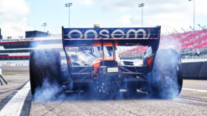 Siegel pulls away in a cloud of smoke. Photo: Kevin Dejewski