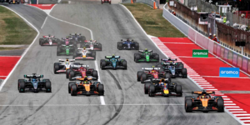 Oscar Piastri led into Turn 1 on the opening lap of the Spanish GP