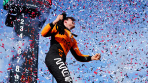 Pato jumped out of his car to a shower of confetti. Photo: Kevin Dejewski