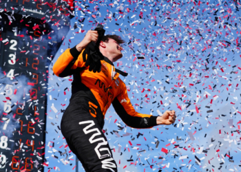 Pato jumped out of his car to a shower of confetti. Photo: Kevin Dejewski