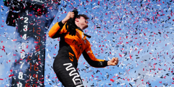 Pato jumped out of his car to a shower of confetti. Photo: Kevin Dejewski