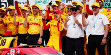 Palou stands next to team owner Chip Ganassi and team manage Barry Wanser in victory lane. Photo: Kevin Dejewski