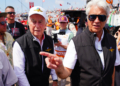 Roger Penske and Penske Entertainment CEO Mark Miles on the grid before an IndyCar event. Photo: Kevin Dejewski