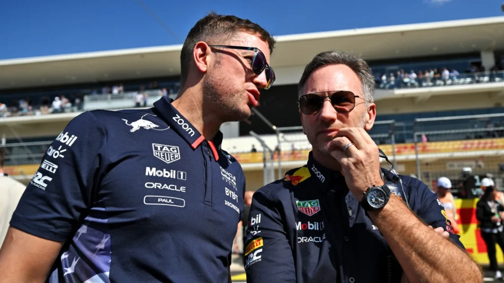 (L to R): Paul Smith (GBR) Red Bull Racing Head of Communications with Christian Horner (GBR) Red Bull Racing Team Principal on the grid