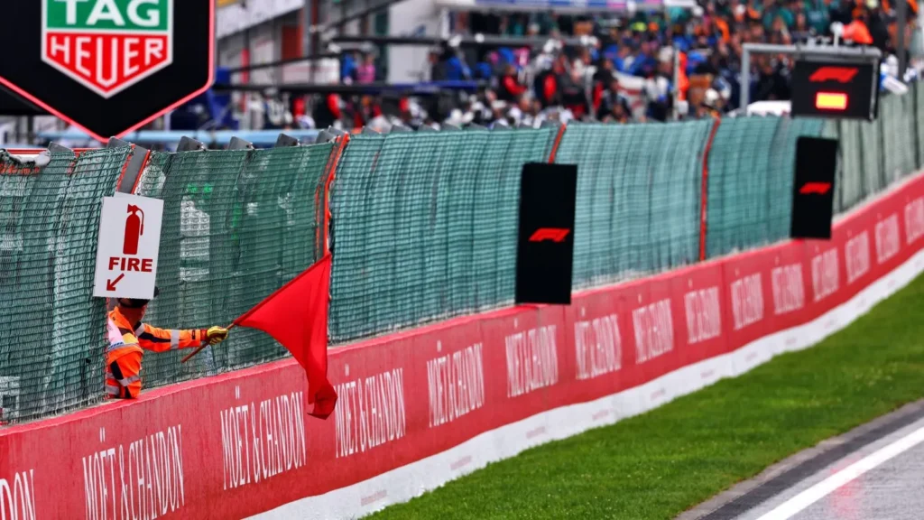 Drivers returned to the pits after the formation lap as the red flag was waved