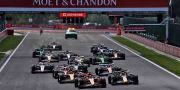 Oscar Piastri led into Turn 1 before Max Verstappen took the lead of the Belgian Sprint