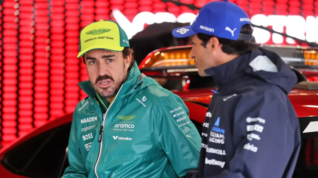 (L to R): Fernando Alonso (ESP) Aston Martin F1 Team with Carlos Sainz (ESP) Atlassian Williams Racing on the drivers' parade. 06.07.2025. Formula 1 World Championship, Rd 12, British Grand Prix, Silverstone, England, Race Day