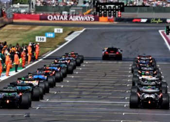 Nico Hulkenberg (GER) Sauber C45 and Oliver Bearman (GBR) Haas VF-25 at the back of the grid before the start of the race. 06.07.2025. Formula 1 World Championship, Rd 12, British Grand Prix, Silverstone, England, Race Day