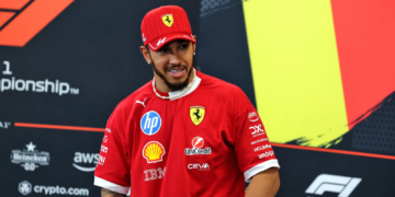 Lewis Hamilton has explained why he has been handing documents to Ferrari