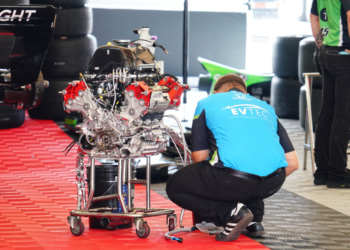 The RLL crew prepares a fresh Honda engine for the #45 entry. Photo: Kevin Dejewski