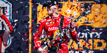 Newgarden celebrated with a special guitar trophy in victory lane. Photo: Kevin Dejewski