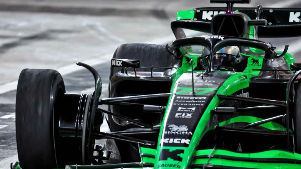 Valtteri Bottas limps back to the pits with a puncture after contact with Kevin Magnussen in Abu Dhabi 2024.