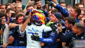 Spot the lucky mascot on Carlos Sainz's helmet