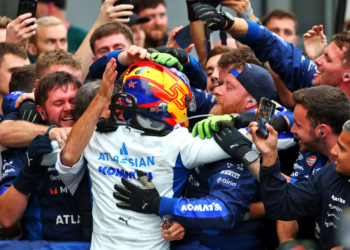 Spot the lucky mascot on Carlos Sainz's helmet