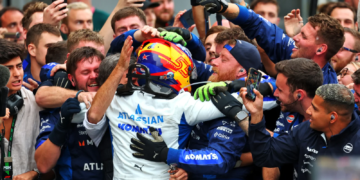 Spot the lucky mascot on Carlos Sainz's helmet