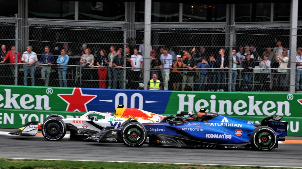 Liam Lawson and Carlos Sainz clashed on Lap 26 when both men looked set for a points finish