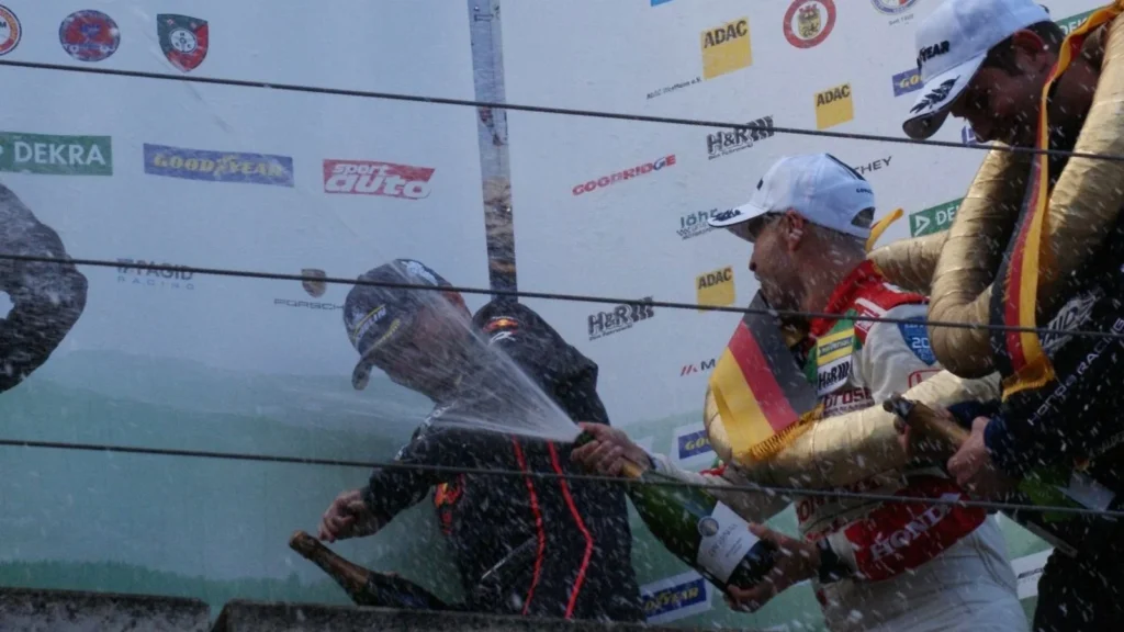 Max Verstappen took the spray on the podium at the Nurburgring. Image: Shanna Lutgert