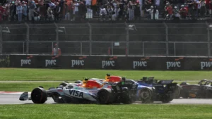 Carlos Sainz picked up damage on the opening lap in Mexico