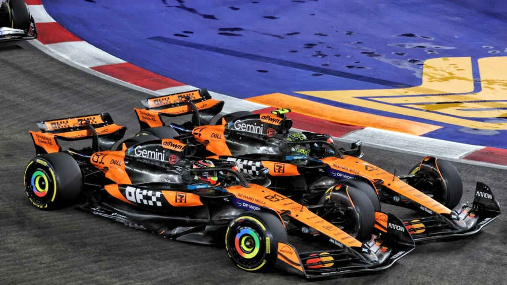 Lando Norris muscled past Oscar Piastri on Lap 1 in Singapore