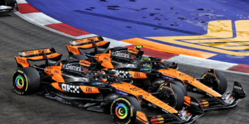 Lando Norris and Oscar Piastri touched on the opening lap in Singapore