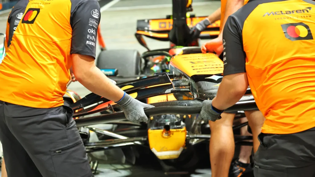 Lando Norris suffered front-wing and tyre damage in FP2 for the Singapore GP, after being hit by Charles Leclerc in the pitlane 