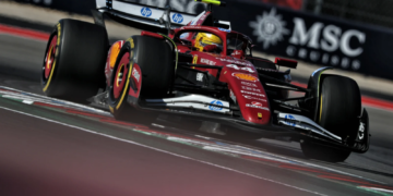 Lewis Hamilton survived a late issue to finish fourth in the US GP