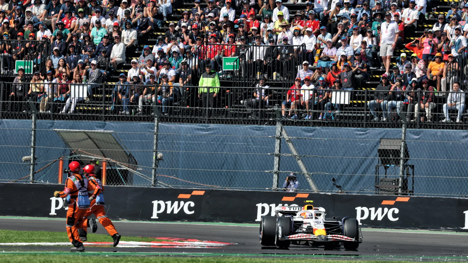 Liam Lawson almost collected two marshals that cleared debris from the track during the Mexico GP