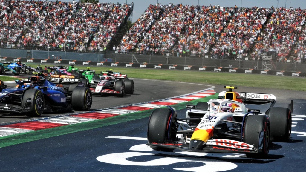 Liam Lawson runs wide during the opening-lap contact with Carlos Sainz, forcing the Racing Bulls driver to pit with front wing damage